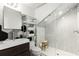 Modern bathroom featuring custom tile work, sleek cabinets and a glass enclosed shower at 69 Randolph Ne St, Atlanta, GA 30312