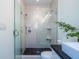 Bathroom showcases modern shower with black pebble floor at 69 Randolph Ne St, Atlanta, GA 30312