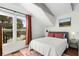 This beautifully decorated bedroom has great natural light, hardwood floors and soft decor at 69 Randolph Ne St, Atlanta, GA 30312