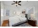 Bright bedroom features hardwood floors, ceiling fan, and sunny windows at 69 Randolph Ne St, Atlanta, GA 30312
