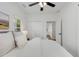 Bedroom boasts a ceiling fan, natural light, and access to closet at 69 Randolph Ne St, Atlanta, GA 30312