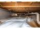 A clean crawl space with a new white vapor barrier at 69 Randolph Ne St, Atlanta, GA 30312