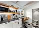 Modern eat-in kitchen features a black and white tile floor, sleek counters and stainless steel appliances at 69 Randolph Ne St, Atlanta, GA 30312