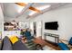 Charming living area with vaulted ceiling, exposed beams, and a kitchenette at 69 Randolph Ne St, Atlanta, GA 30312