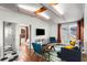 Stylish living room featuring exposed wooden beams, hardwood floors, and access to a bedroom and bathroom at 69 Randolph Ne St, Atlanta, GA 30312