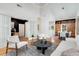 Bright living room with hardwood floors, modern furniture, and abundant natural light at 69 Randolph Ne St, Atlanta, GA 30312