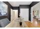 Office showcasing hardwood floors, neutral paint, and entry to dining room at 69 Randolph Ne St, Atlanta, GA 30312
