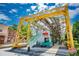 Unique outdoor structure with a yellow metal frame, teal accents, and open-air design at 69 Randolph Ne St, Atlanta, GA 30312
