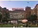 Exterior view of Ponce City Market featuring a lawn area with seating and string lights at 69 Randolph Ne St, Atlanta, GA 30312