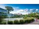 Scenic view of a pond with a fountain, lush greenery, and buildings in the background at 69 Randolph Ne St, Atlanta, GA 30312
