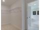 Walk-in closet with carpet, white walls, and wire shelving at 110 Prescott Manor Dr, Canton, GA 30115