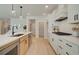 Gourmet kitchen with stainless steel appliances, modern cabinetry, large sink, and spacious countertops at 110 Prescott Manor Dr, Canton, GA 30115