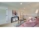 Open concept living room with hardwood floors, stylish decor and a cozy seating area at 110 Prescott Manor Dr, Canton, GA 30115