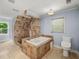 Bathroom showcases a tiled tub and shower combination at 1212 Lee Whatley Dr, Lithonia, GA 30058