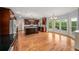 Spacious kitchen features cherry cabinets, stainless appliances, granite counters, and a large island at 1212 Lee Whatley Dr, Lithonia, GA 30058