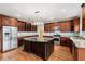 Spacious kitchen featuring stainless steel appliances and a large center island at 1212 Lee Whatley Dr, Lithonia, GA 30058