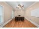 Bright office featuring hardwood floors, neutral walls, and a ceiling fan at 1212 Lee Whatley Dr, Lithonia, GA 30058