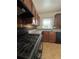 Well-equipped kitchen with granite countertops, wooden cabinets, and stainless steel appliances at 2069 Bixler Circle, Decatur, GA 30032