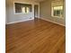 Cozy living room featuring hardwood floors, natural light, and neutral paint at 2069 Bixler Circle, Decatur, GA 30032