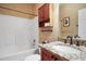 Full bath featuring a granite vanity, new fixtures, and tub with shower at 2108 Waters Edge Trl, Roswell, GA 30075