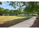 Green lawn area within the community featuring a covered pavilion at 2108 Waters Edge Trl, Roswell, GA 30075