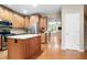 Modern kitchen with wood cabinets, granite countertops, and stainless steel appliances at 2108 Waters Edge Trl, Roswell, GA 30075