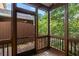 This cozy screened porch provides peaceful outdoor space and a lovely view at 2108 Waters Edge Trl, Roswell, GA 30075