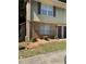 Multi-story brick and vinyl sided apartment building with new gutters at 31 Villa Se Ct, Smyrna, GA 30080