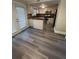 Kitchen with island, stainless steel appliances and door leading to outside at 31 Villa Se Ct, Smyrna, GA 30080