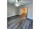 Open concept living room has lots of natural light and plank flooring at 31 Villa Se Ct, Smyrna, GA 30080