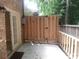 Private brick patio with wooden privacy fence at 31 Villa Se Ct, Smyrna, GA 30080