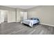 Bedroom with hardwood floors, walk-in closet, and ensuite bathroom at 3302 Dogwood Dr # 123, Atlanta, GA 30354