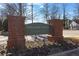 Dogwood Court Condominium community sign surrounded by greenery at 3302 Dogwood Dr # 123, Atlanta, GA 30354