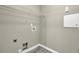 Laundry room with connections ready for a washer and dryer. Gray vinyl flooring at 3302 Dogwood Dr # 123, Atlanta, GA 30354