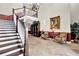 Spacious lobby with staircase, travertine flooring, and comfortable seating area at 3302 Dogwood Dr # 123, Atlanta, GA 30354