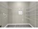 Walk-in closet with custom shelving, providing ample storage space for organization at 3302 Dogwood Dr # 123, Atlanta, GA 30354