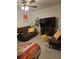 Cozy living room showcasing comfortable seating, a ceiling fan and a decorative rug at 7848 Rock Rose Ln, Fairburn, GA 30213