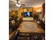 Cozy living room with comfortable leather seating and a decorative rug at 7848 Rock Rose Ln, Fairburn, GA 30213