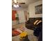 Comfortable living room with brown reclining sofa and decorative rug at 7848 Rock Rose Ln, Fairburn, GA 30213
