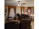 Spacious living room with comfortable seating and natural light from windows at 7848 Rock Rose Ln, Fairburn, GA 30213