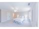 Bedroom featuring neutral decor, plush carpet, white bedding, and an attached bathroom at 9175 Etching Overlook, Johns Creek, GA 30097