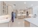 Spacious kitchen with custom cabinets, modern appliances, and a large island, perfect for culinary enthusiasts at 9175 Etching Overlook, Johns Creek, GA 30097
