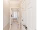Convenient laundry room area with washer, dryer and a refrigerator at 9175 Etching Overlook, Johns Creek, GA 30097