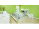 Bedroom featuring natural light, bright walls, and neutral carpet at 13347 Henderson Ct, Hampton, GA 30228
