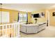 Comfortable living room with cozy seating area, tv and natural light at 13347 Henderson Ct, Hampton, GA 30228