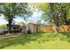 Spacious backyard with a shed, mature trees, and a well-maintained lawn, perfect for outdoor enjoyment at 30 Sessions Nw St, Marietta, GA 30060