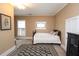 Well-lit bedroom with classic furnishings and a cozy area rug at 30 Sessions Nw St, Marietta, GA 30060