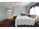 Comfortable bedroom featuring a fireplace, hardwood floors, and neutral decor at 30 Sessions Nw St, Marietta, GA 30060