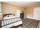 Bedroom with hardwood floors, neutral paint and a decorative area rug at 30 Sessions Nw St, Marietta, GA 30060