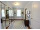 Spacious bedroom with mirrored closet doors and a neutral color scheme at 30 Sessions Nw St, Marietta, GA 30060